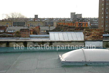 Rooftop view above minimal apartment in east London. NB new building block has been erected. Ask office for more details.