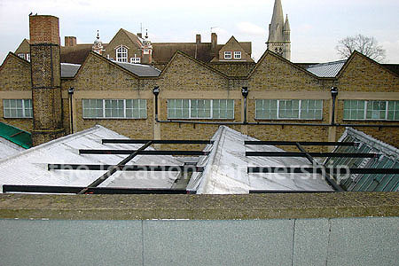 Rooftop view above minimal apartment in east London. NB new building block has been erected. Ask office for more details.