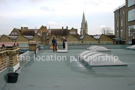 Rooftop view above minimal apartment in east London. NB new building block has been erected. Ask office for more details.