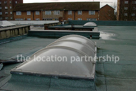 Rooftop view above minimal apartment in east London. NB new building block has been erected. Ask office for more details.