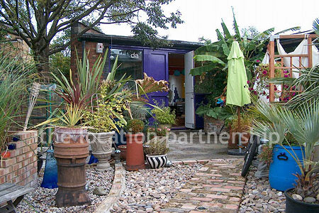 Ground floor apartment with back yard.