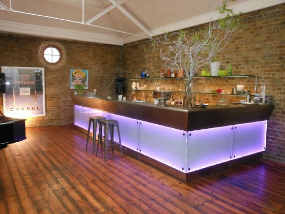3,500 sq ft of space including a warehouse studio and darkroom behind spread over 4 floors of a townhouse with an eclectic mix of Georgian and Edwardian styles retaining original features.