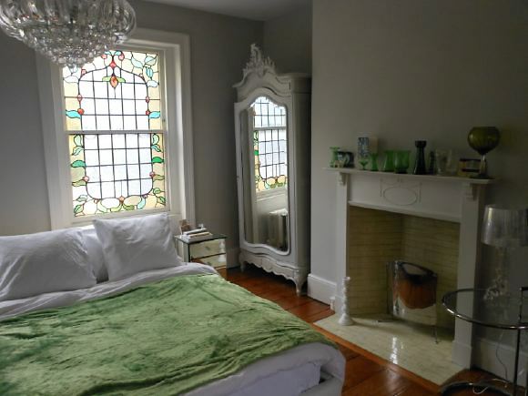 3,500 sq ft of space including a warehouse studio and darkroom behind spread over 4 floors of a townhouse with an eclectic mix of Georgian and Edwardian styles retaining original features.