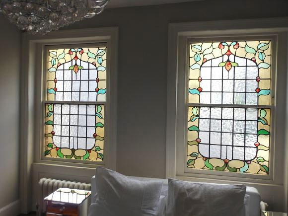 3,500 sq ft of space including a warehouse studio and darkroom behind spread over 4 floors of a townhouse with an eclectic mix of Georgian and Edwardian styles retaining original features.
