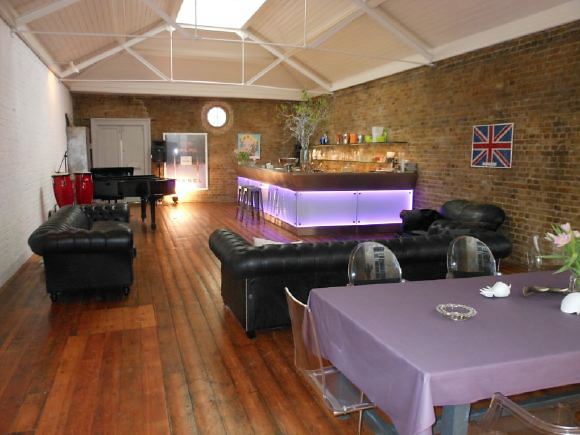3,500 sq ft of space including a warehouse studio and darkroom behind spread over 4 floors of a townhouse with an eclectic mix of Georgian and Edwardian styles retaining original features.