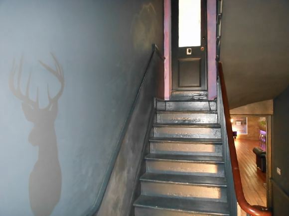 3,500 sq ft of space including a warehouse studio and darkroom behind spread over 4 floors of a townhouse with an eclectic mix of Georgian and Edwardian styles retaining original features.