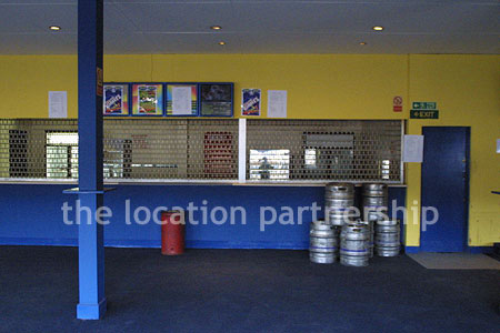 Large blue and yellow canteen, restaurant area at event venue