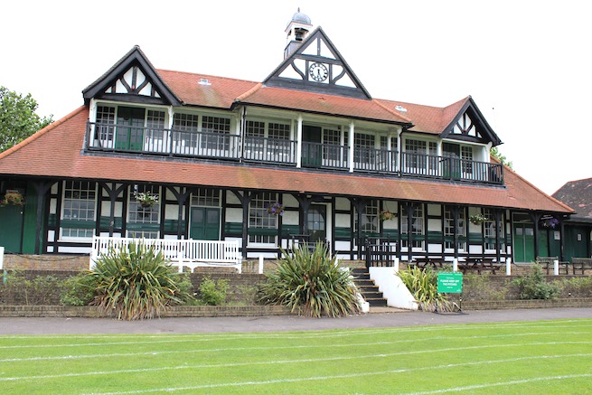 Lovely cricket pavilion built in 1886 filled with memorabilia inside. Listed building. Surrounded by cricket pitch and athletics track.
