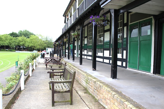 Lovely cricket pavilion built in 1886 filled with memorabilia inside. Listed building. Surrounded by cricket pitch and athletics track.