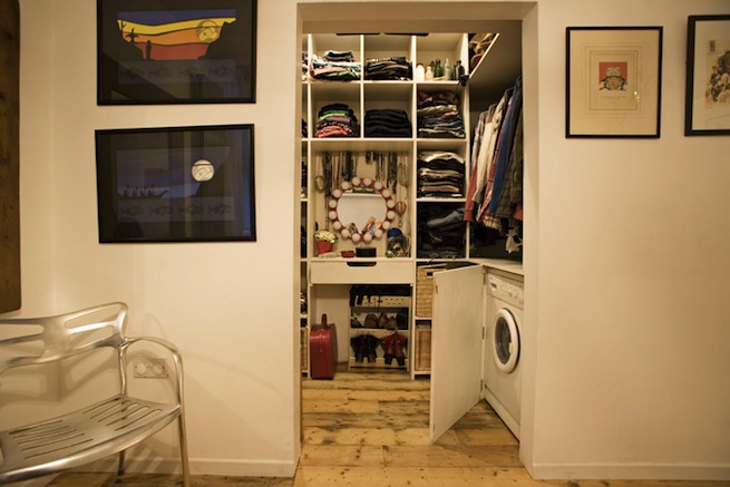 Bright, modern flat with wooden floors and open kitchen and living areas.
