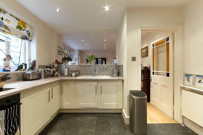 Modernised ground floor garden flat in Victorian purpose built block of 3 flats.