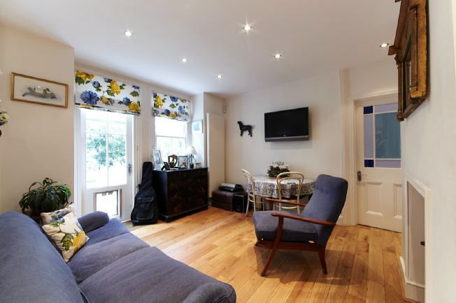 Modernised ground floor garden flat in Victorian purpose built block of 3 flats.