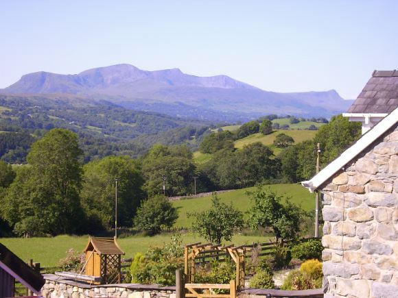 Traditional Welsh, working farmhouse with magnificent views.