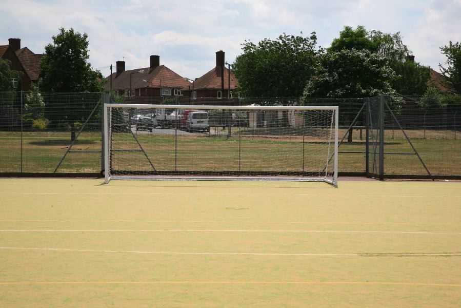Astro pitches with a suburban backdrop