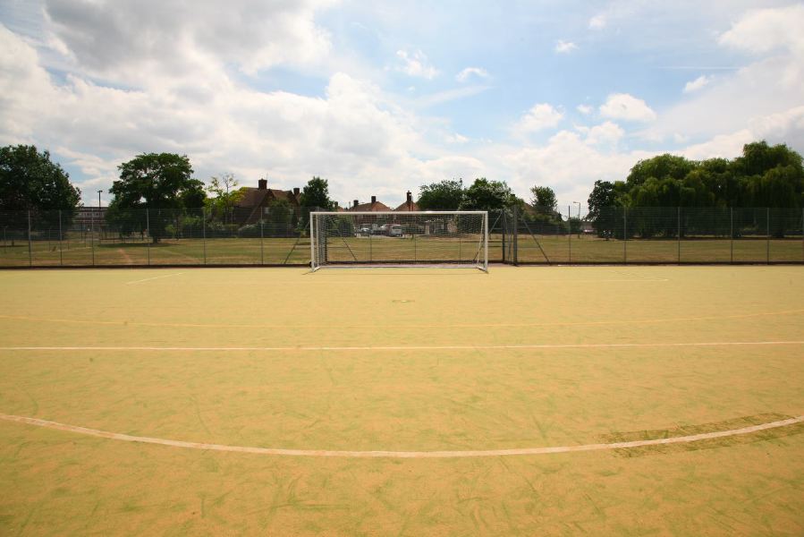 Astro pitches with a suburban backdrop