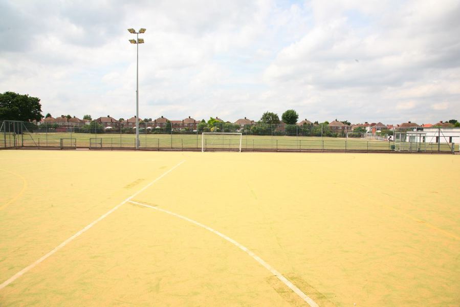 Astro pitches with a suburban backdrop