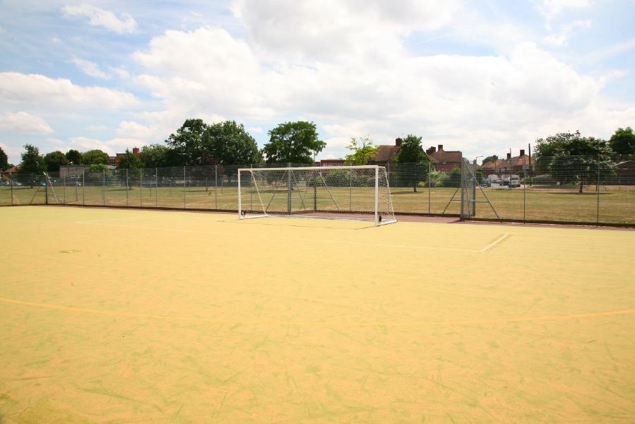 Astro pitches with a suburban backdrop