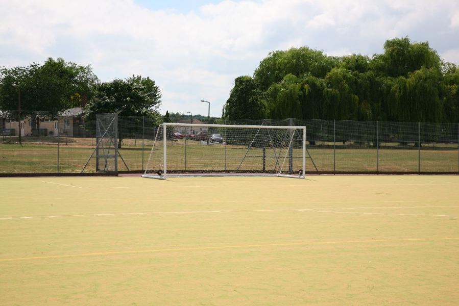 Astro pitches with a suburban backdrop