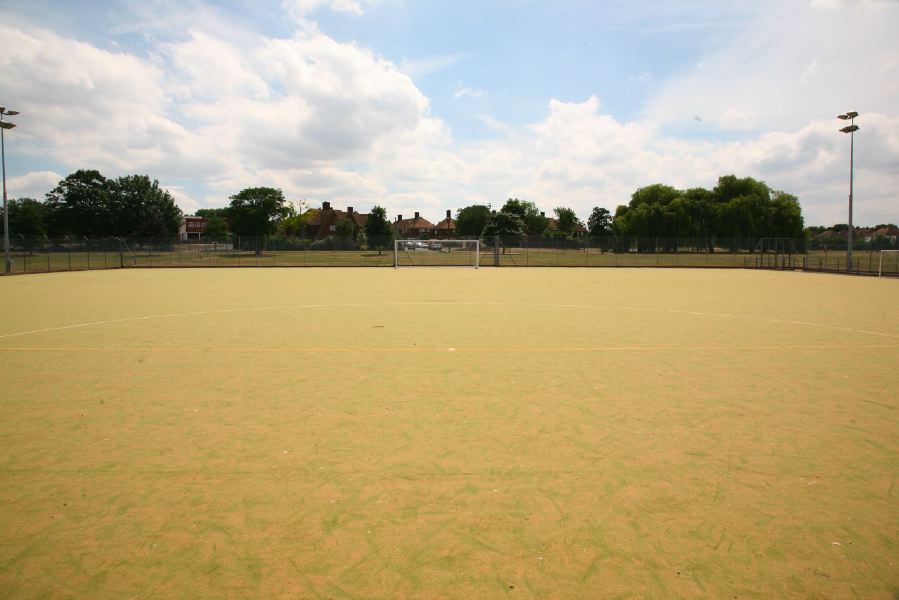 Astro pitches with a suburban backdrop