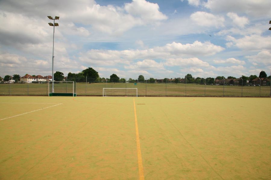 Astro pitches with a suburban backdrop