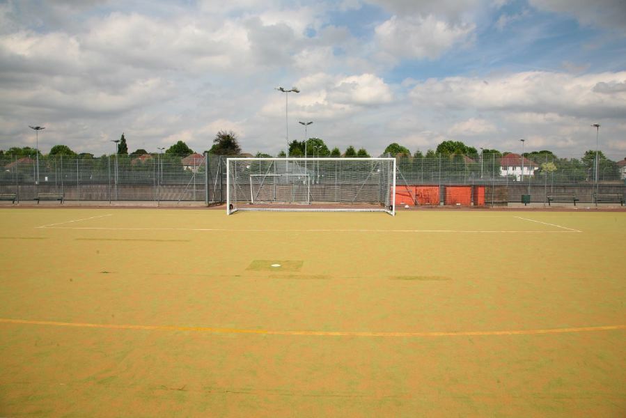 Astro pitches with a suburban backdrop
