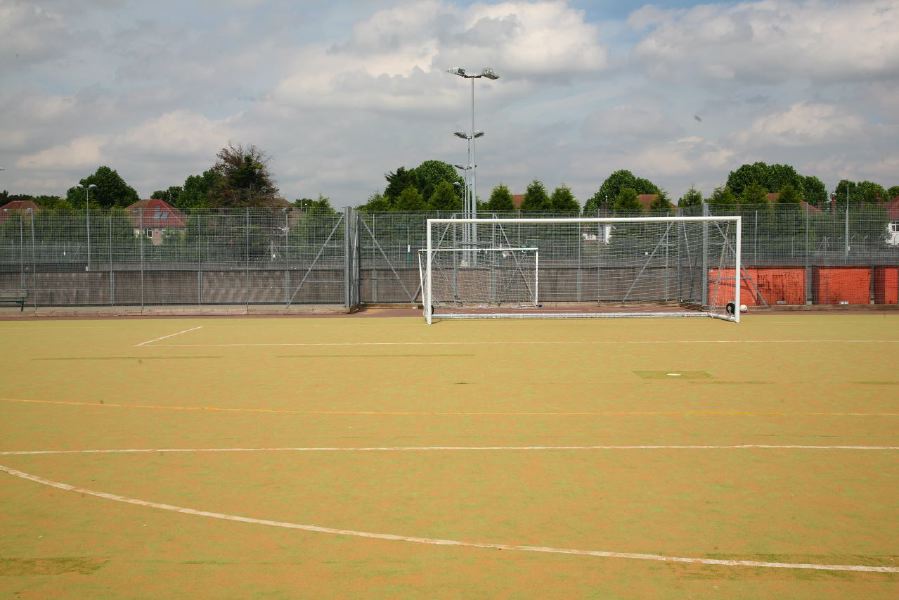 Astro pitches with a suburban backdrop