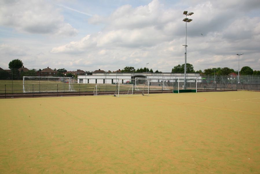 Astro pitches with a suburban backdrop