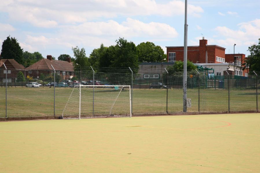 Astro pitches with a suburban backdrop