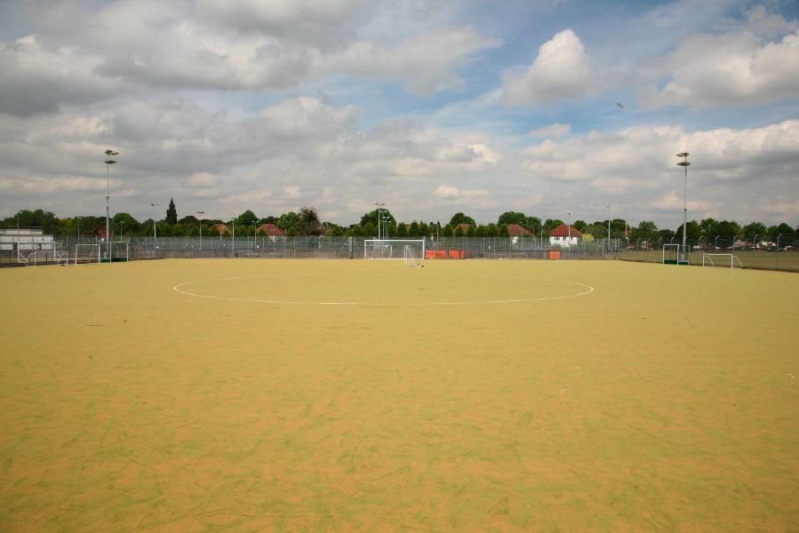 Astro pitches with a suburban backdrop