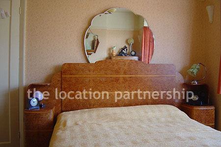 An authentic 1930's semi-detached house with original features and mix of thirties and fifties furniture giving plenty of period charm.