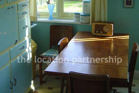 An authentic 1930's semi-detached house with original features and mix of thirties and fifties furniture giving plenty of period charm.