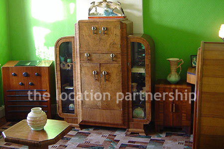 An authentic 1930's semi-detached house with original features and mix of thirties and fifties furniture giving plenty of period charm.