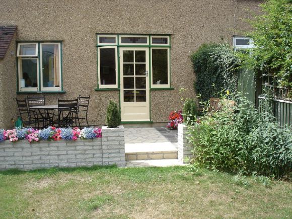 An authentic 1930's semi-detached house with original features and mix of thirties and fifties furniture giving plenty of period charm.
