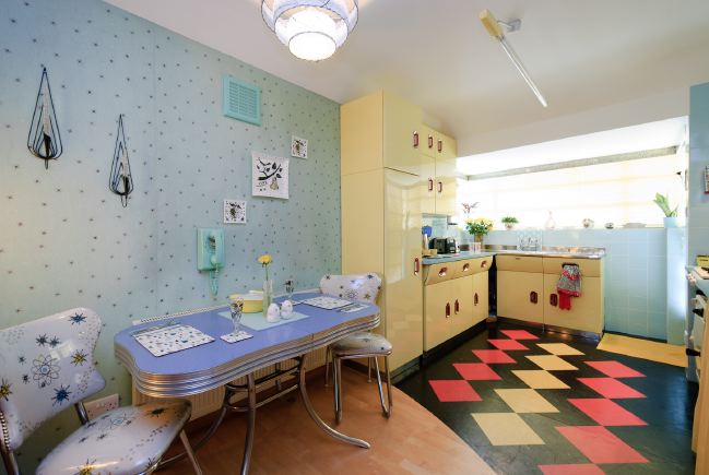 Pre-war bungalow renovated to give a Californian mid century Modern feel. The furnishings, fittings and decor are all authentic 40's. 50's. There is a large front and rear garden and long private driveway.