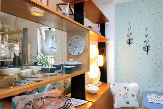Pre-war bungalow renovated to give a Californian mid century Modern feel. The furnishings, fittings and decor are all authentic 40's. 50's. There is a large front and rear garden and long private driveway.