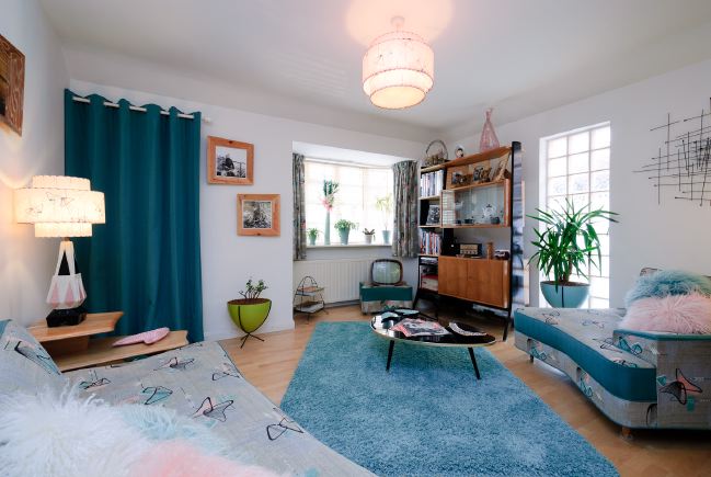 Pre-war bungalow renovated to give a Californian mid century Modern feel. The furnishings, fittings and decor are all authentic 40's. 50's. There is a large front and rear garden and long private driveway.