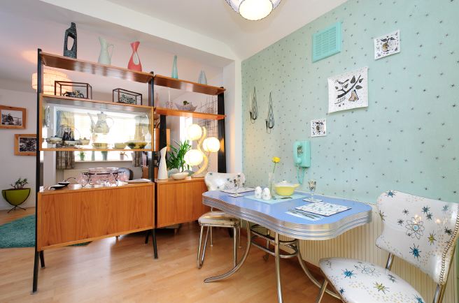 Pre-war bungalow renovated to give a Californian mid century Modern feel. The furnishings, fittings and decor are all authentic 40's. 50's. There is a large front and rear garden and long private driveway.