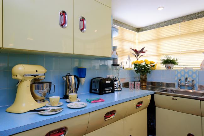 Pre-war bungalow renovated to give a Californian mid century Modern feel. The furnishings, fittings and decor are all authentic 40's. 50's. There is a large front and rear garden and long private driveway.