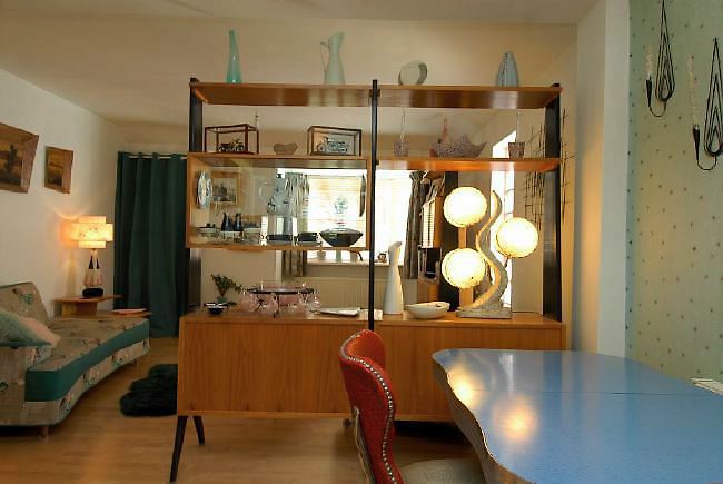 Pre-war bungalow renovated to give a Californian mid century Modern feel. The furnishings, fittings and decor are all authentic 40's. 50's. There is a large front and rear garden and long private driveway.