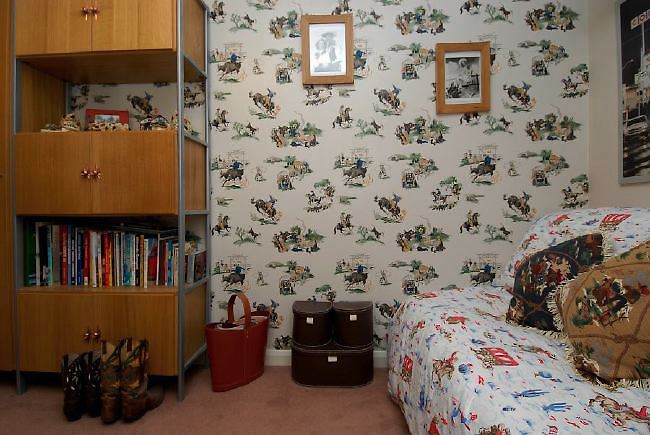 Pre-war bungalow renovated to give a Californian mid century Modern feel. The furnishings, fittings and decor are all authentic 40's. 50's. There is a large front and rear garden and long private driveway.