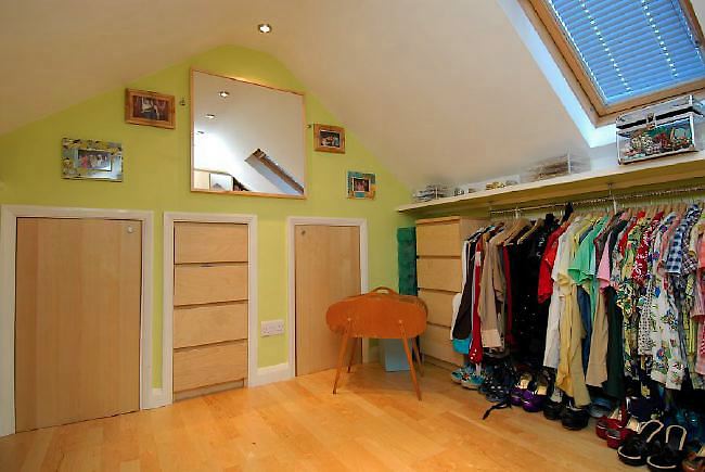 Pre-war bungalow renovated to give a Californian mid century Modern feel. The furnishings, fittings and decor are all authentic 40's. 50's. There is a large front and rear garden and long private driveway.
