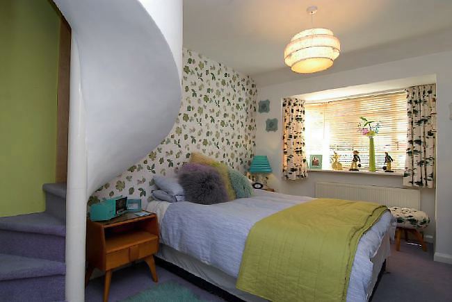 Pre-war bungalow renovated to give a Californian mid century Modern feel. The furnishings, fittings and decor are all authentic 40's. 50's. There is a large front and rear garden and long private driveway.
