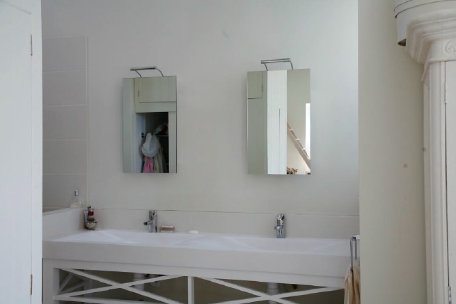 Great contemporary free-standing bath in a huge light bedroom with plantation shutters and a separate en-suite.