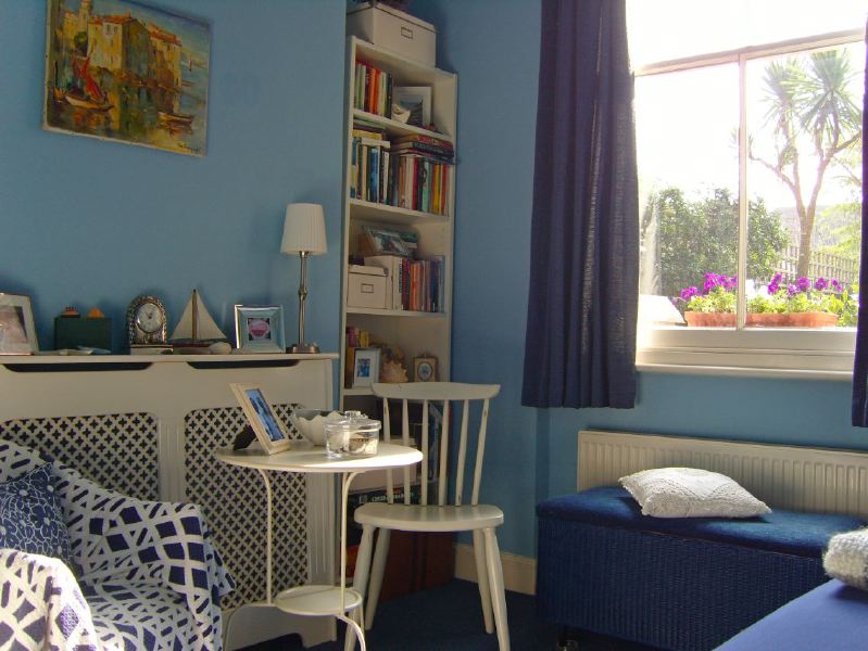 Lovely garden flat in a Victorian red brick house with a conservatory looking into a mature garden