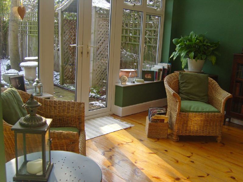 Lovely garden flat in a Victorian red brick house with a conservatory looking into a mature garden