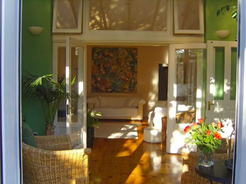 Lovely garden flat in a Victorian red brick house with a conservatory looking into a mature garden