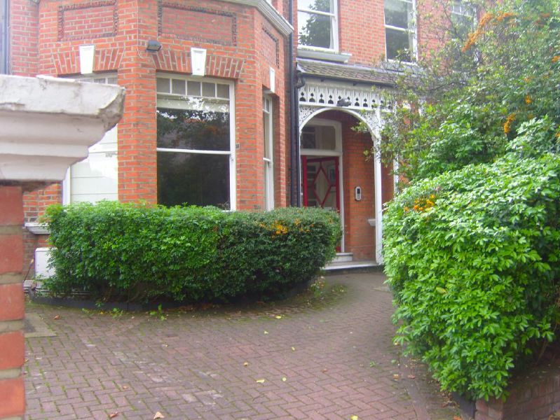 Lovely garden flat in a Victorian red brick house with a conservatory looking into a mature garden