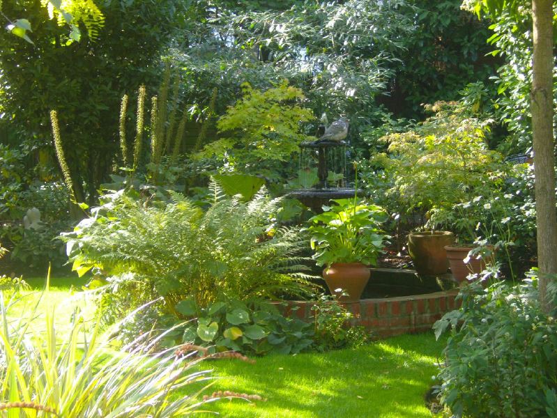 Lovely garden flat in a Victorian red brick house with a conservatory looking into a mature garden