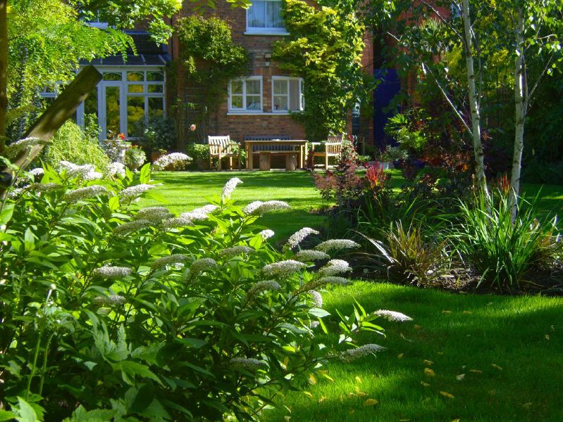 Lovely garden flat in a Victorian red brick house with a conservatory looking into a mature garden