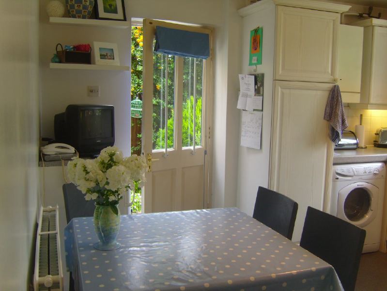 Lovely garden flat in a Victorian red brick house with a conservatory looking into a mature garden